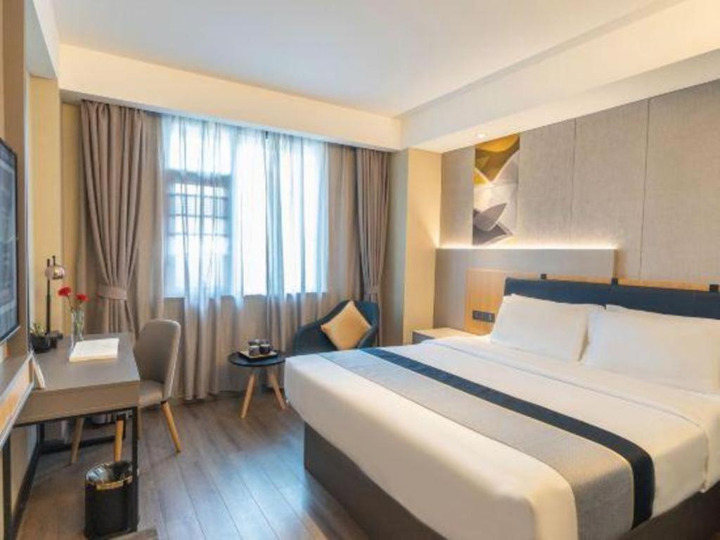 Home Inn Kunming Baita Road Куньмин Экстерьер фото