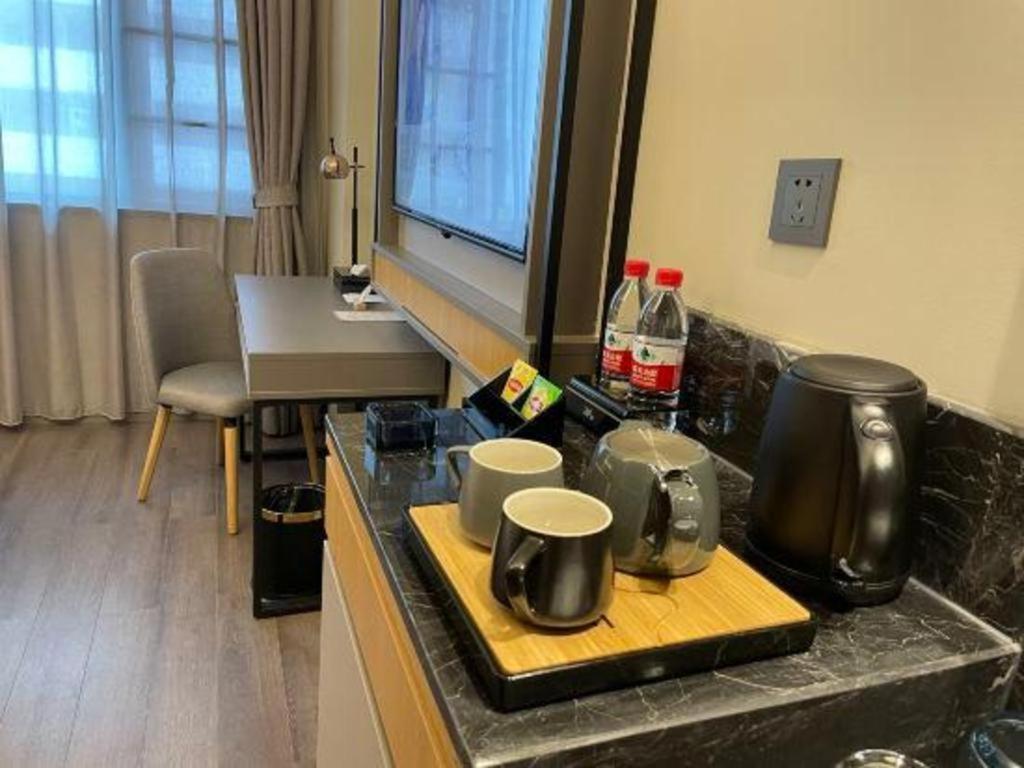 Home Inn Kunming Baita Road Куньмин Экстерьер фото