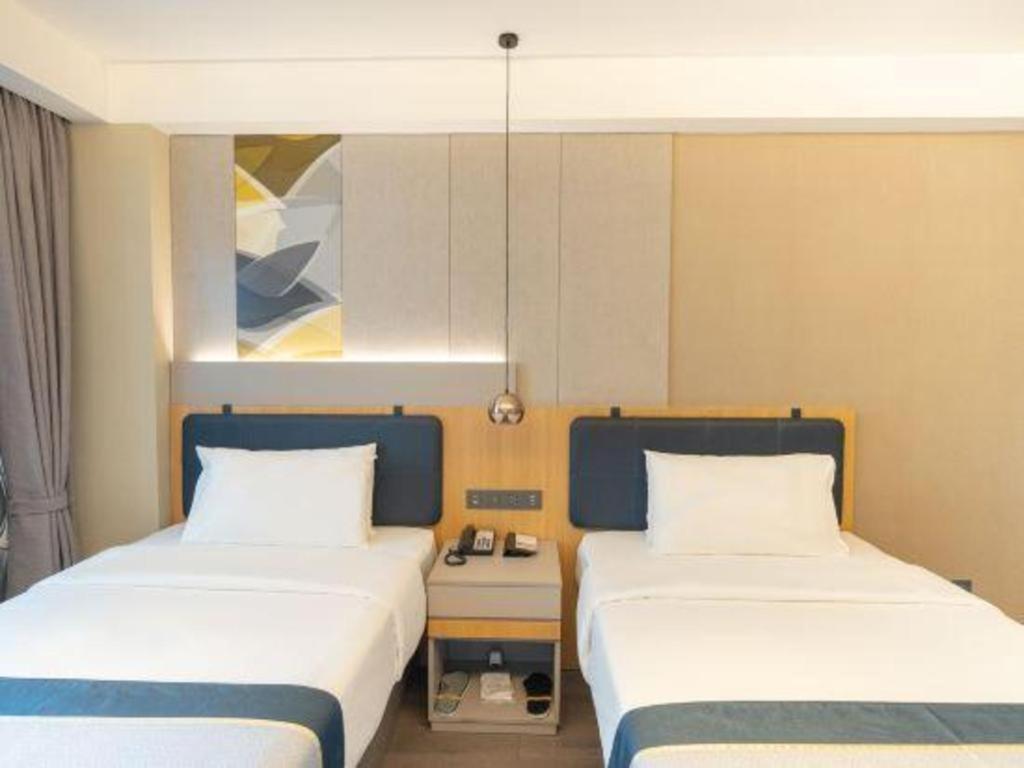 Home Inn Kunming Baita Road Куньмин Экстерьер фото