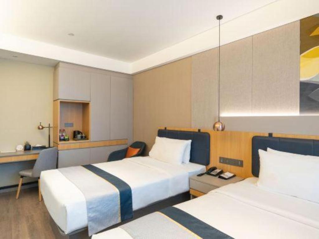 Home Inn Kunming Baita Road Куньмин Экстерьер фото