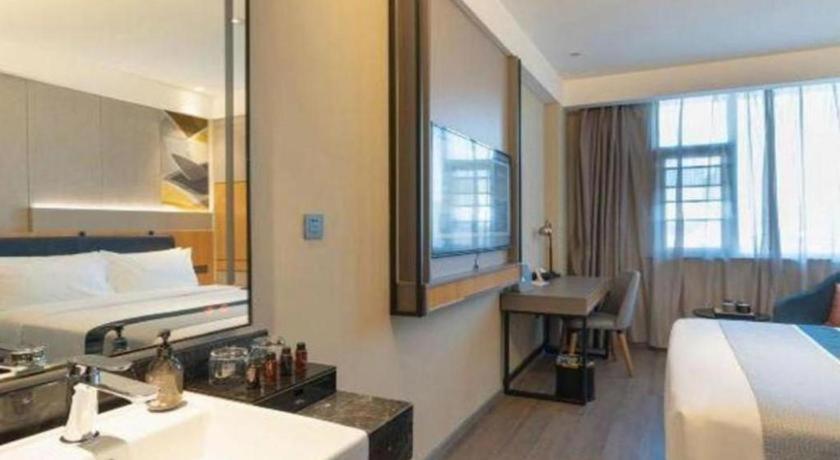 Home Inn Kunming Baita Road Куньмин Экстерьер фото