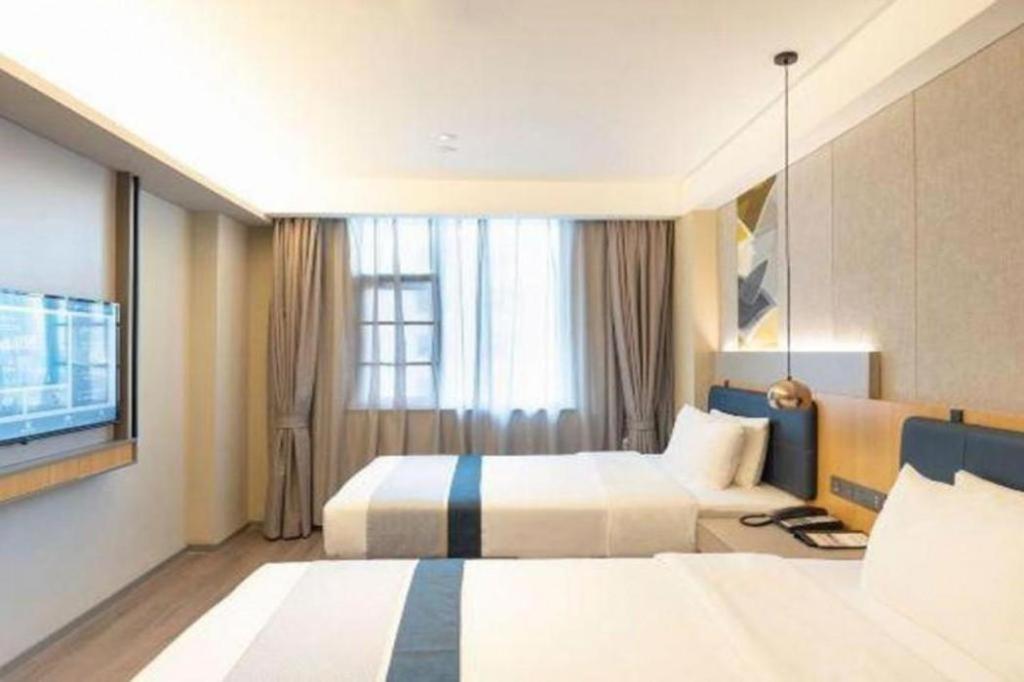 Home Inn Kunming Baita Road Куньмин Экстерьер фото