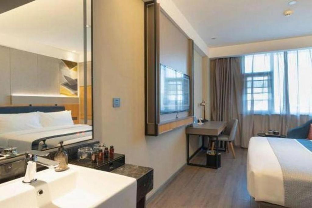 Home Inn Kunming Baita Road Куньмин Экстерьер фото